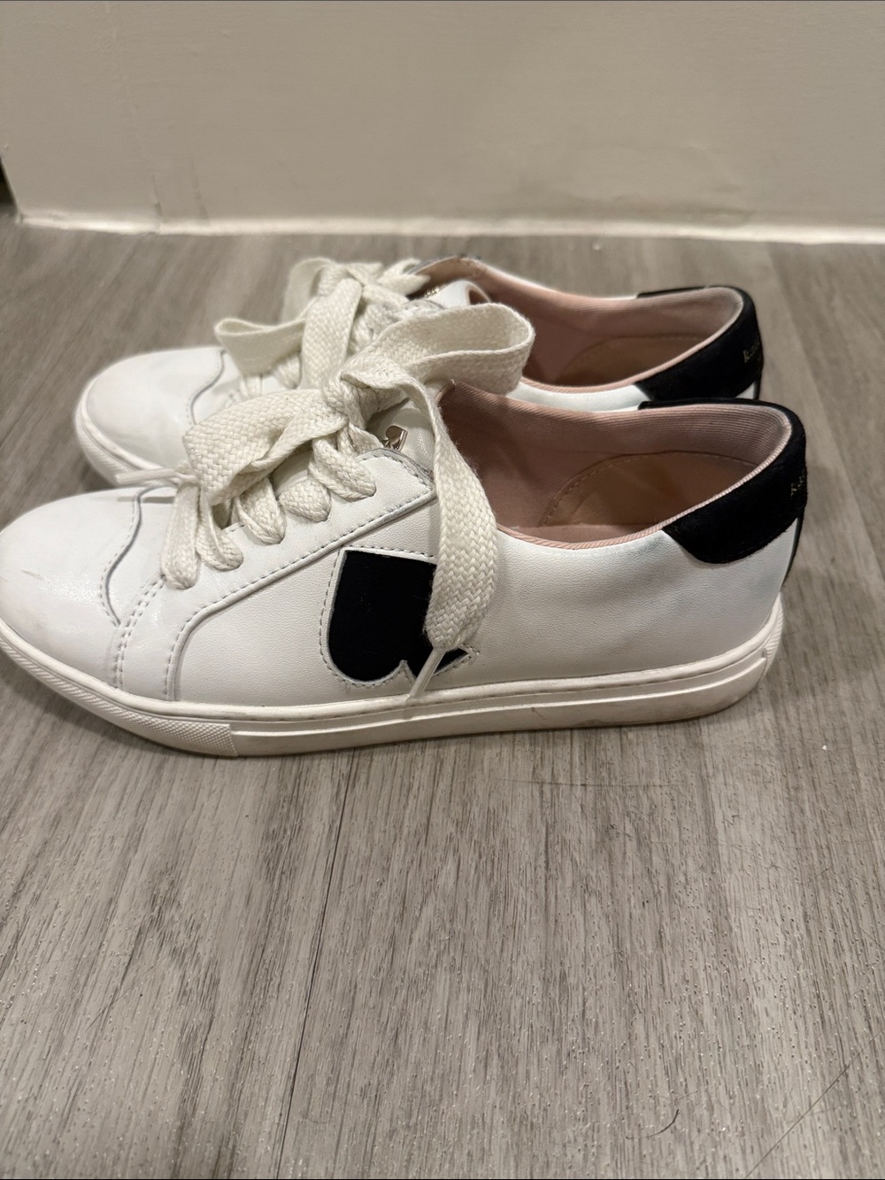 Kate Spade  Fez Women's White Leather Low-Top Sneakers with Black Accents